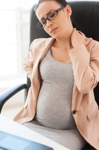 Pregnant at work.